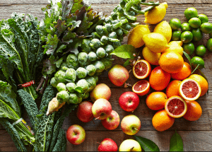 a group of fruits and vegetables on a wood surface Healthy Weight Loss Diets Uppingham